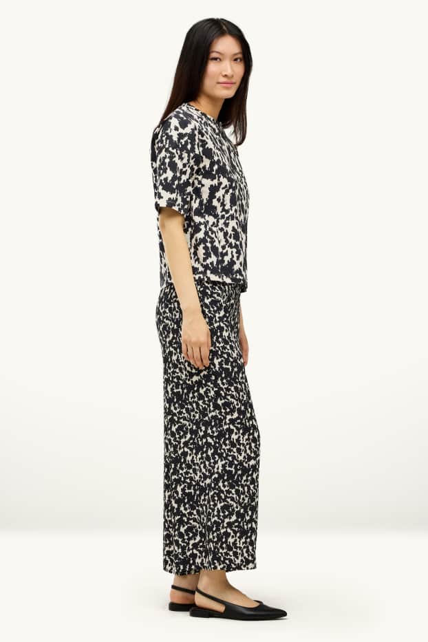 Femmes - Pantalon en toile court - mid waist - wide leg - à motif - noir / beige