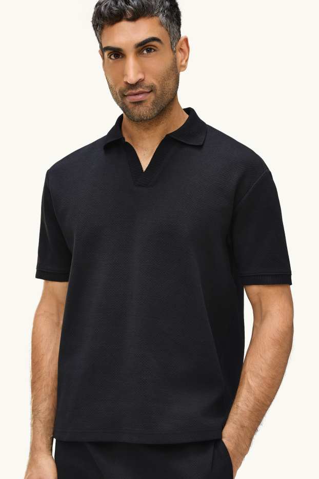 Hommes - Polo - relaxed fit - finition texturée - noir