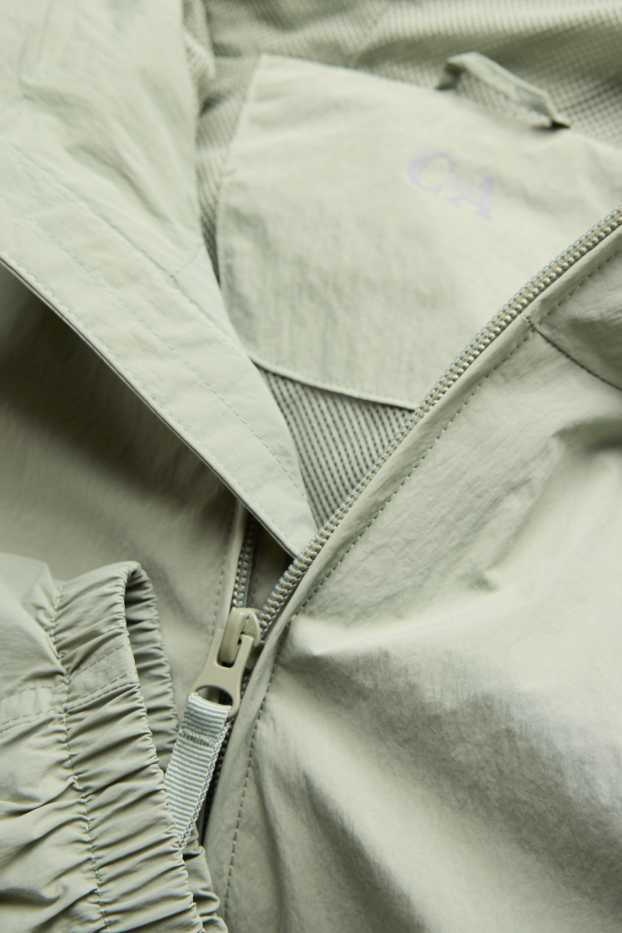 Uomo - Giacca impermeabile con cappuccio - idrorepellente - verde chiaro