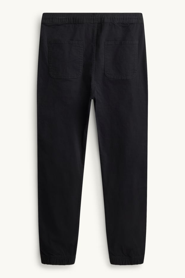 Men - Chinos - tapered fit - black