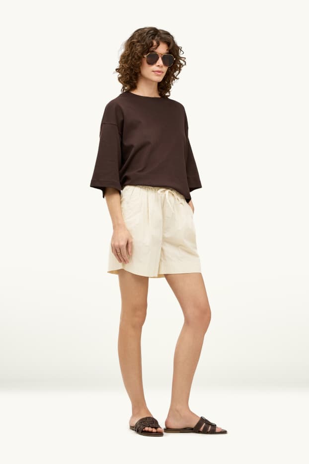 Dona - Pantalons curts - mid waist - crema