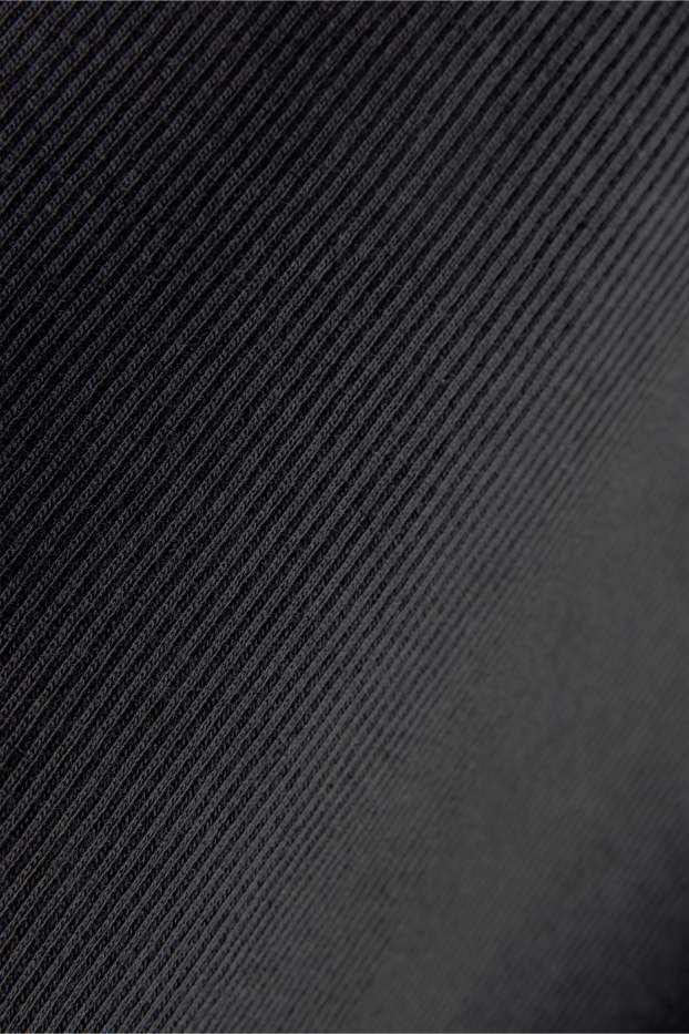 Dames - T-shirt - slim fit - ribstof - zwart