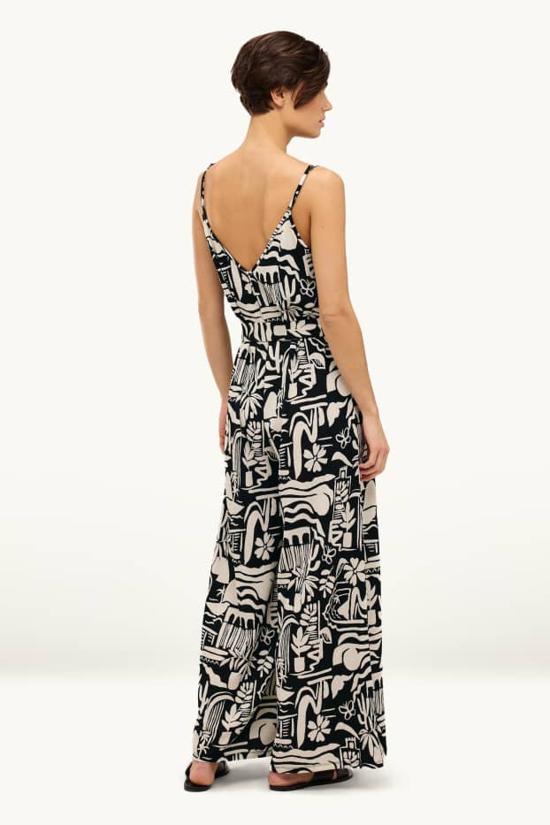Damen - Jumpsuit mit V-Ausschnitt und Gürtel - gemustert - schwarz / weiss