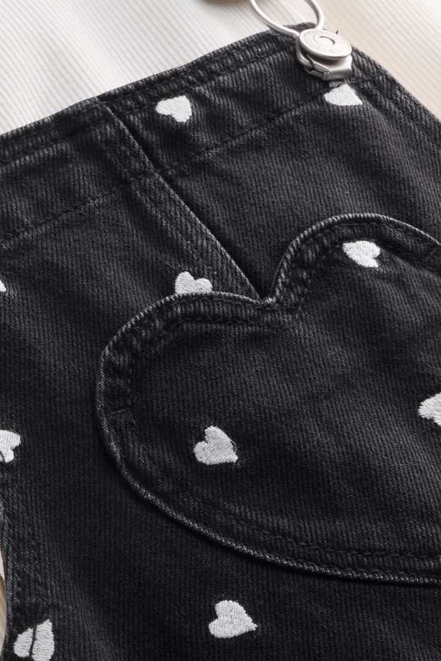 Kinderen: meisjes - Hartje - set - longsleeve en denim overgooier - 2 delig - wit / zwart