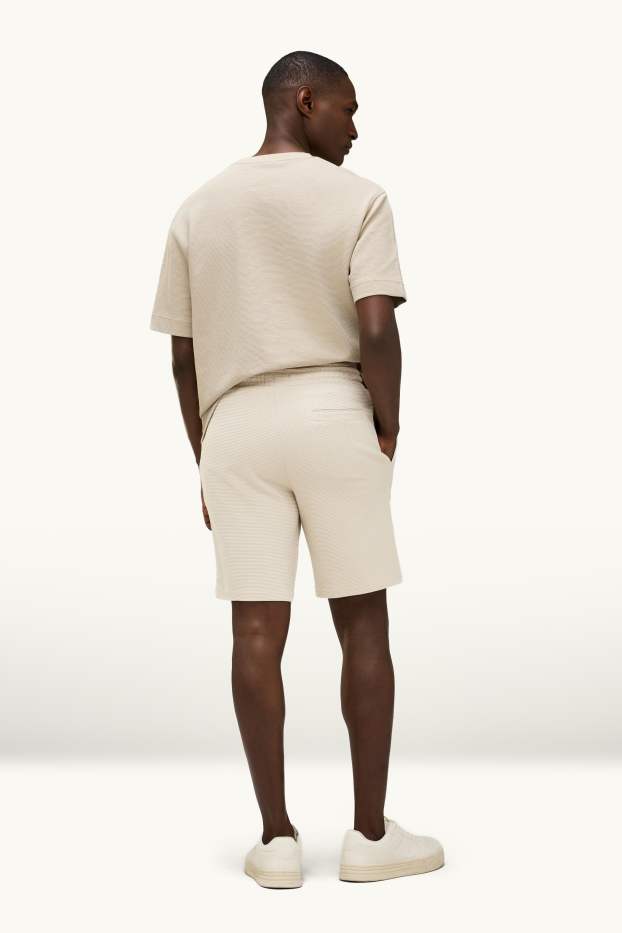 Hommes - Short - finition côtelée - beige