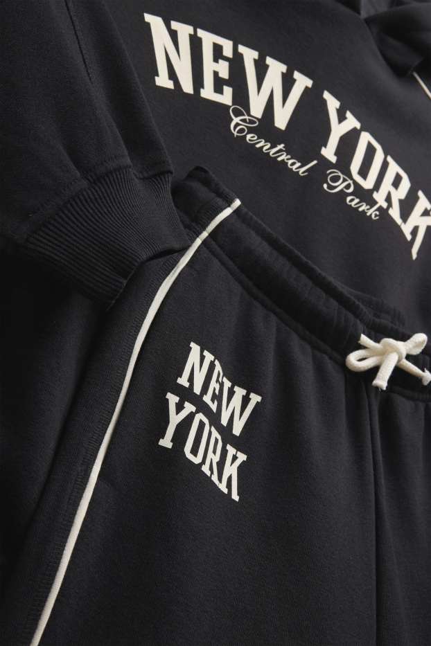Nena - New York - conjunt - dessuadora amb caputxa i pantalons de xandall - 2 peces - negre
