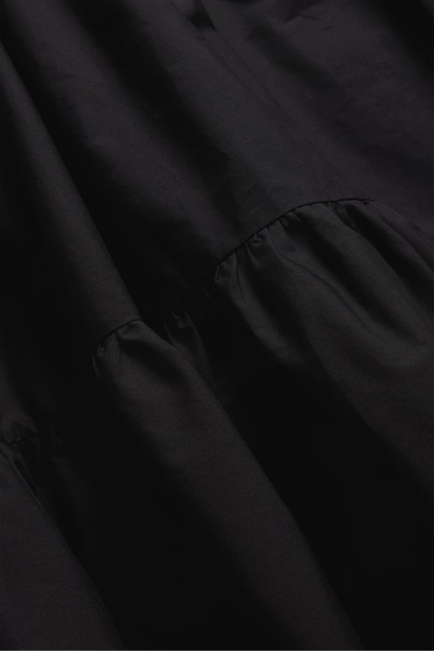 Dámské - Šaty fit & flare s výstřihem ve tvaru V - černá
