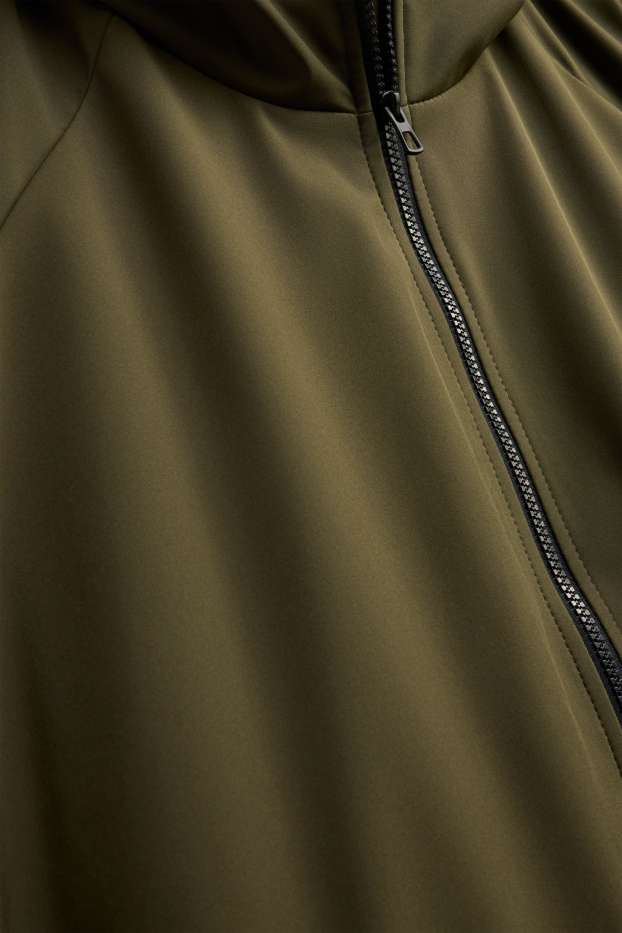 Femmes - Veste à coquille souple avec capuche - finition déperlante - 4 Way Stretch - vert foncé