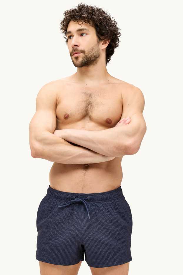 Hommes - Short de bain - finition texturée - bleu foncé