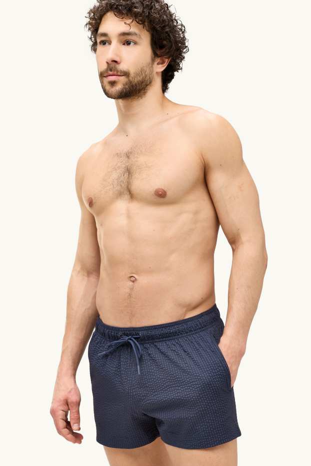 Hommes - Short de bain - finition texturée - bleu foncé