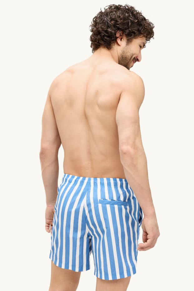 Men - Swim shorts - striped - blue / white