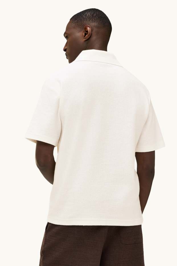 Heren - Gebreid poloshirt - relaxed fit - wit