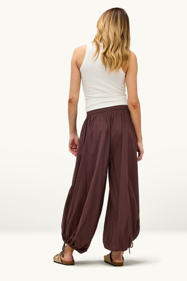 Donna - Pantaloni harem - vita media - balloon leg - marrone