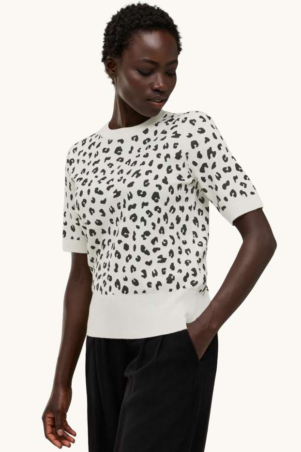 Femmes - Pull de maille - manches courtes - imprimé léopard - blanc / noir