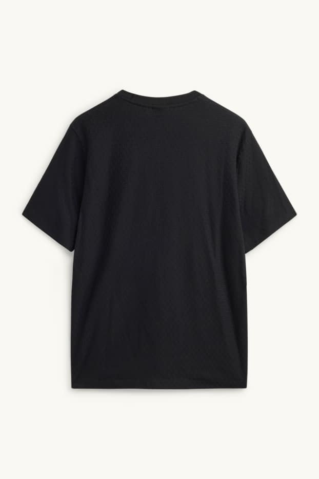 Uomo - T-shirt - regular fit - tessuto tramato - nero