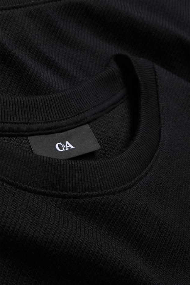 Hommes - Sweat - finition texturée - noir