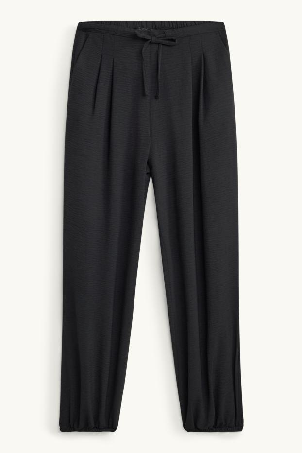 Women - Harem trousers - mid-rise waist - balloon leg - black