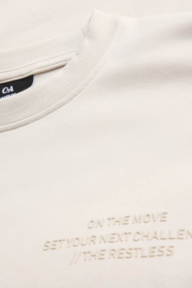 Heren - Sportshirt - relaxed fit - crèmekleurig