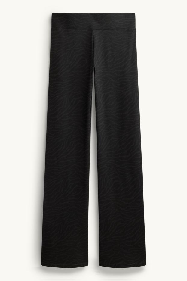 Dona - Leggings straight - estampat - negre