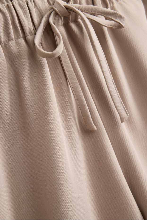 Femei - Pantaloni office - talie medie - wide leg - bej