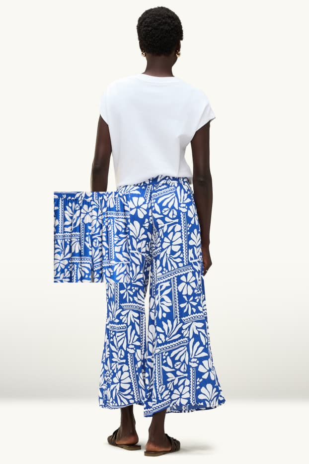 Donna - Pantaloni di stoffa - vita media - palazzo - fantasia - blu / bianco
