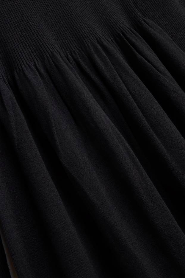 Femmes - Robe en maille - finition côtelée - noir