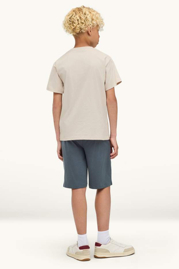 Bambini - Calcio - set - t-shirt e shorts - 2 pezzi - blu / crema