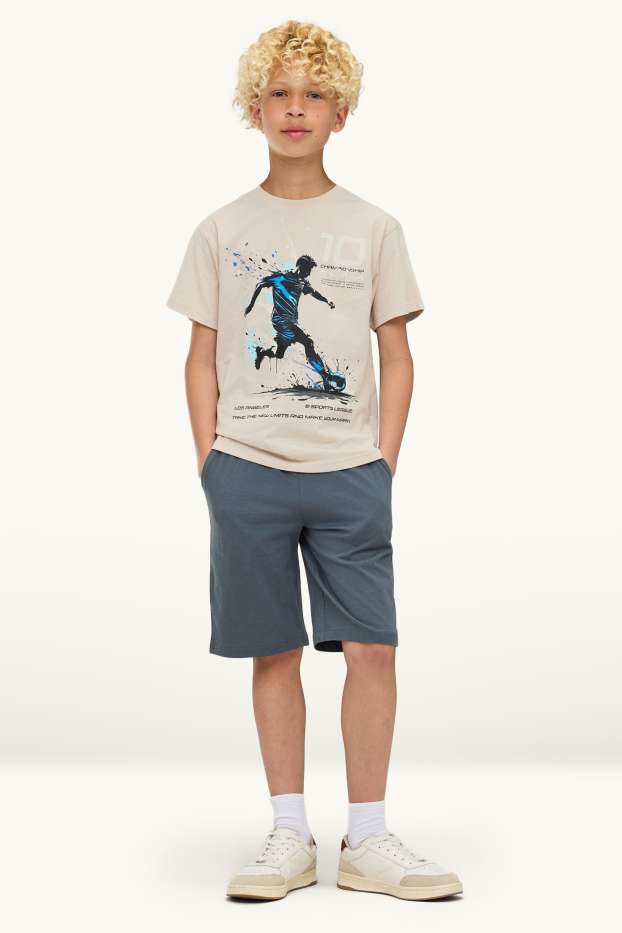 Bambini - Calcio - set - t-shirt e shorts - 2 pezzi - blu / crema