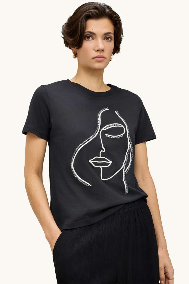 Femmes - T-shirt - regular fit - effet brillant - noir