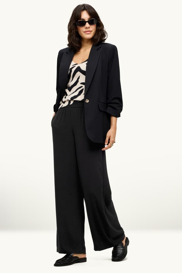 Femei - Pantaloni de stofă - talie medie - palazzo - negru