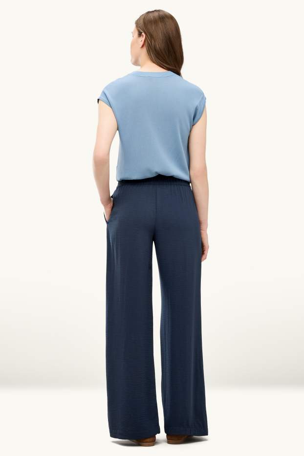 Dámské - Plátěné kalhoty - mid waist - palazzo - tmavomodrá
