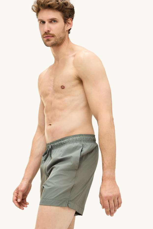 Hommes - Short de bain - look 2-en-1 - vert foncé