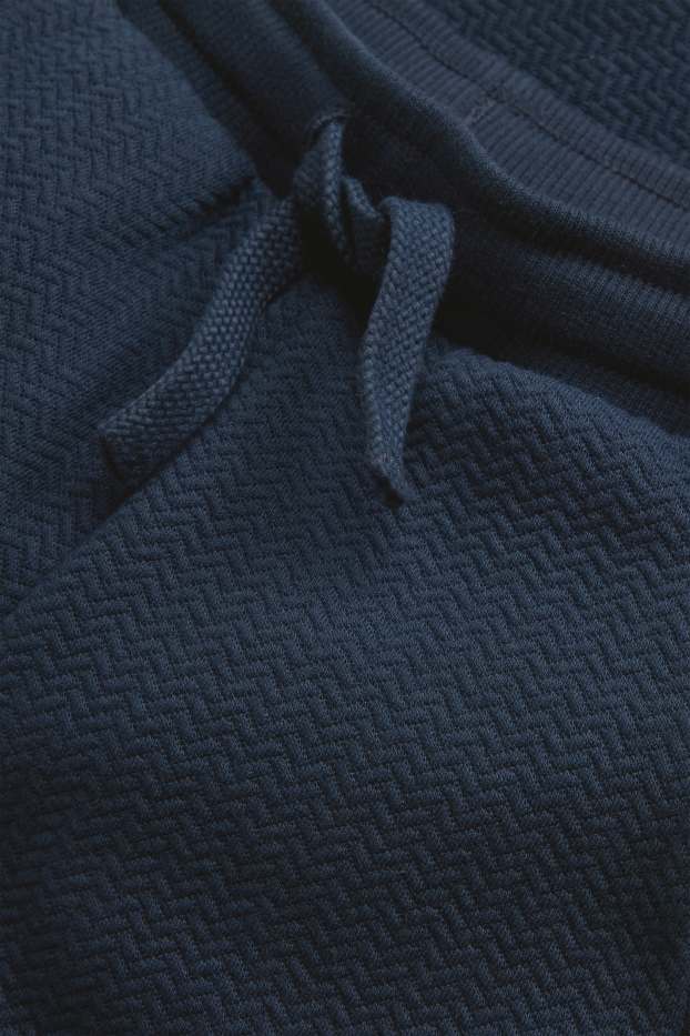 Kinderen: jongens - Joggingbroek - met structuur - donkerblauw
