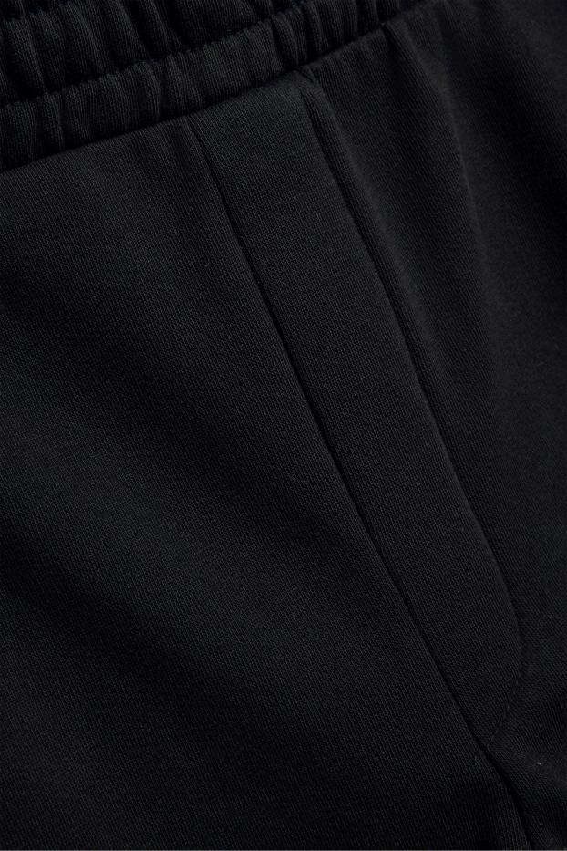 Uomo - Pantaloni sportivi - nero