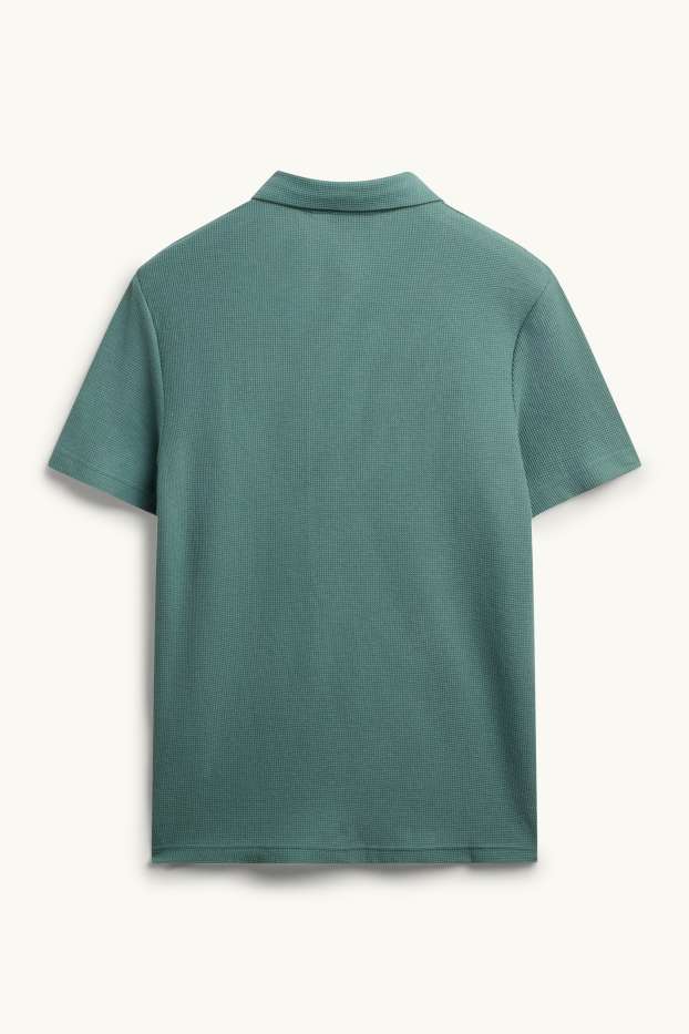 Hommes - Polo - regular fit - finition texturée - bleu pétrole