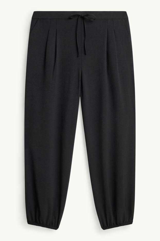 Women - Harem trousers - mid-rise waist - balloon leg - black