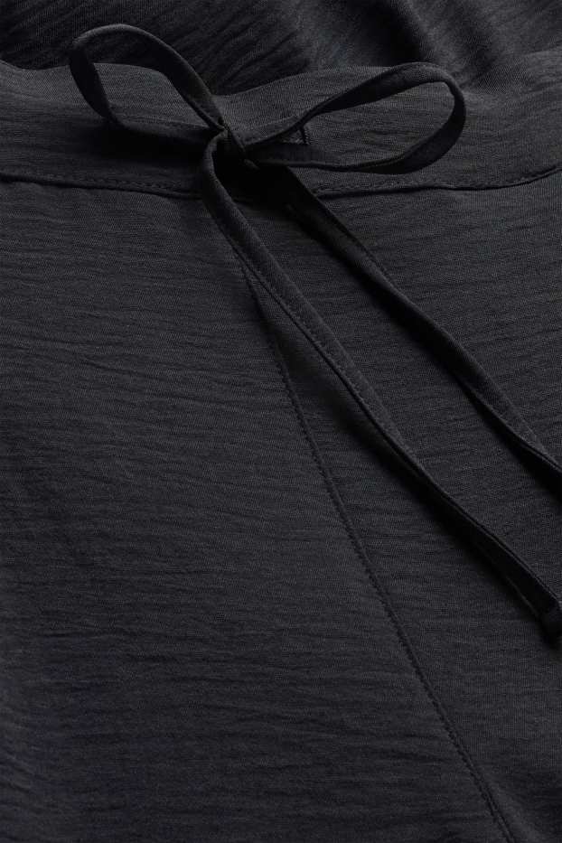 Women - Harem trousers - mid-rise waist - balloon leg - black