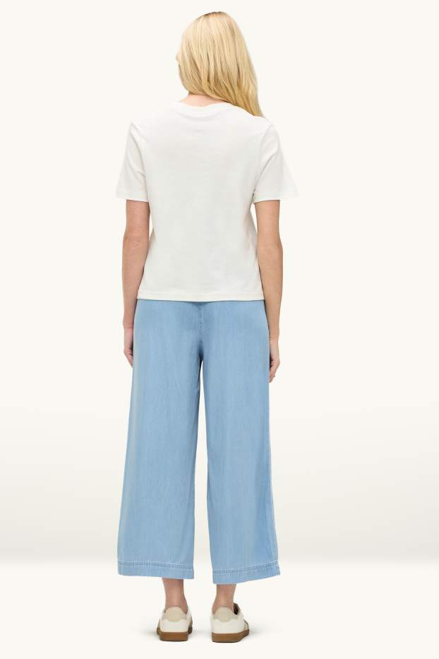 Dames - Kortere pantalon met ceintuur - high waist - wide leg - jeanslichtblauw