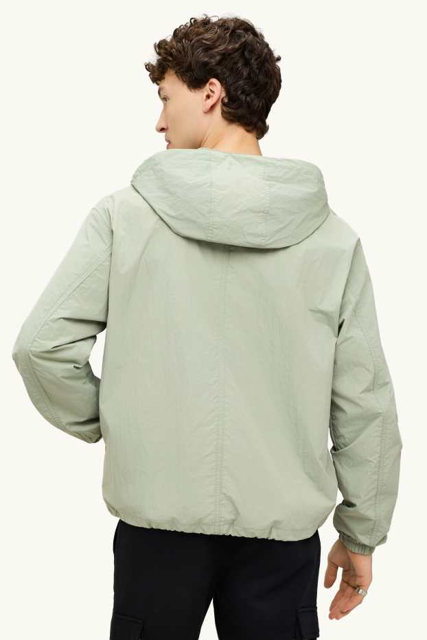 Uomo - Giacca impermeabile con cappuccio - idrorepellente - verde chiaro