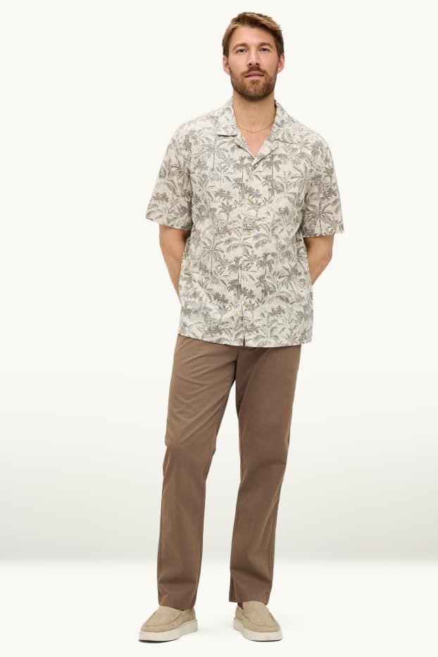 Uomo - Pantaloni chino - tapered fit - marrone