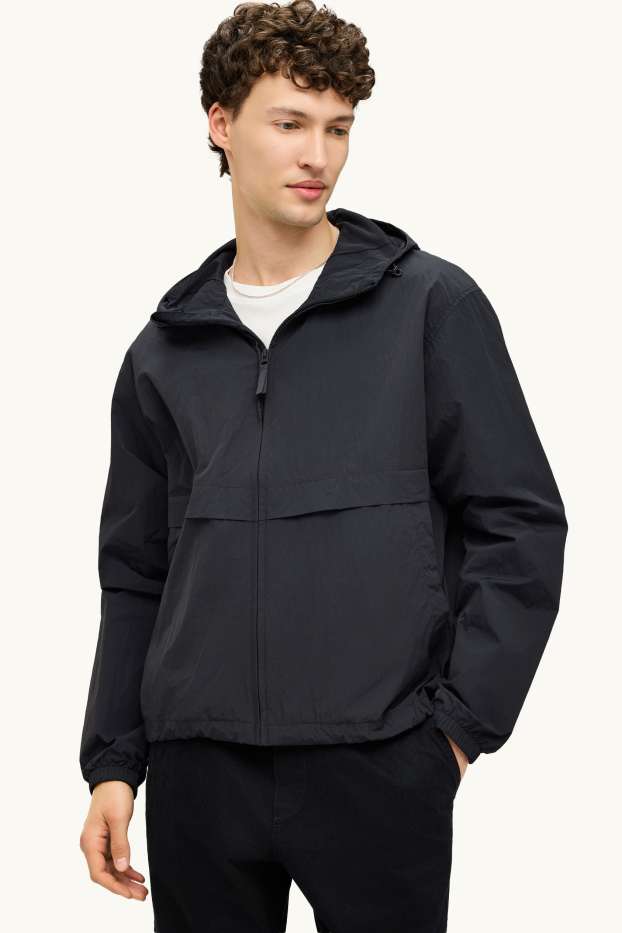 Uomo - Giacca impermeabile con cappuccio - idrorepellente - nero