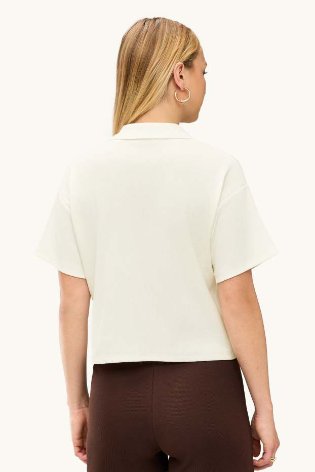 Dona - Polo - slim fit - acanalat - blanc trencat