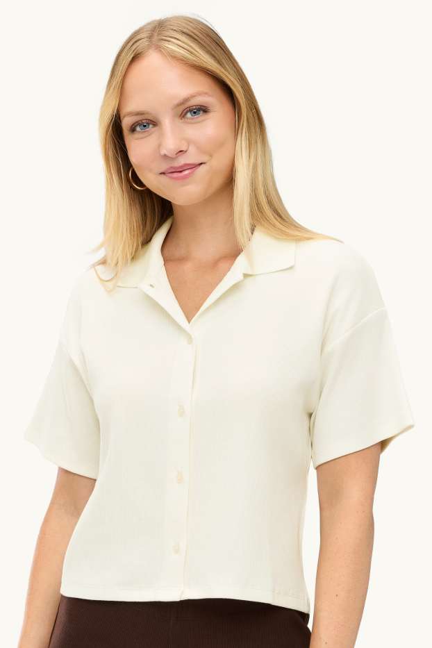 Dona - Polo - slim fit - acanalat - blanc trencat