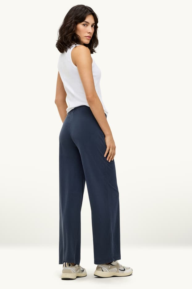 Dona - Pantalons de tela - mid waist - palazzo - blau fosc
