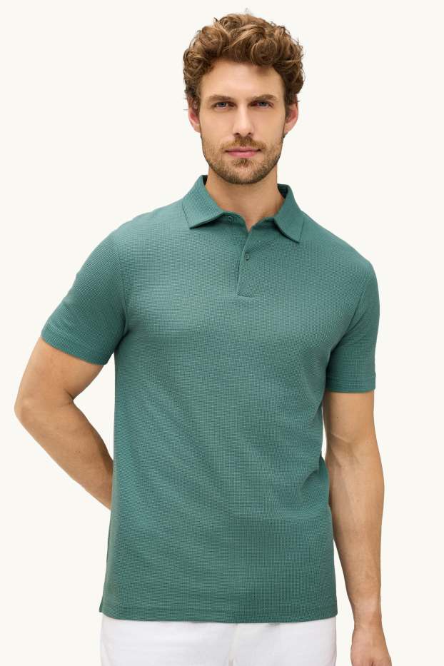 Hommes - Polo - regular fit - finition texturée - bleu pétrole