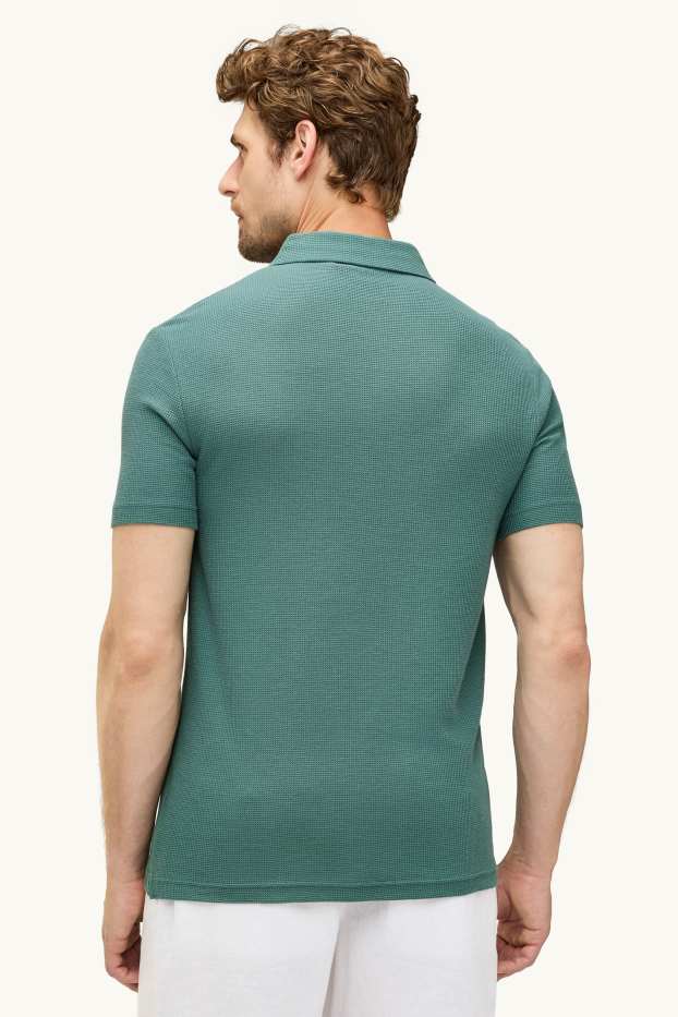 Hommes - Polo - regular fit - finition texturée - bleu pétrole