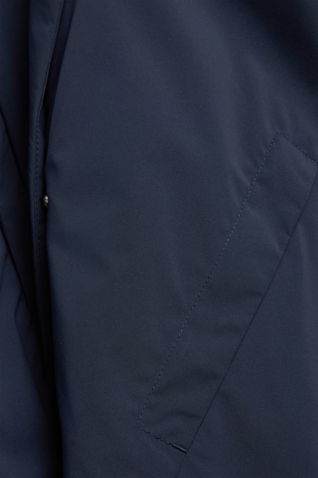 Dona - Jaqueta tècnica amb caputxa - folrada - impermeable - blau fosc