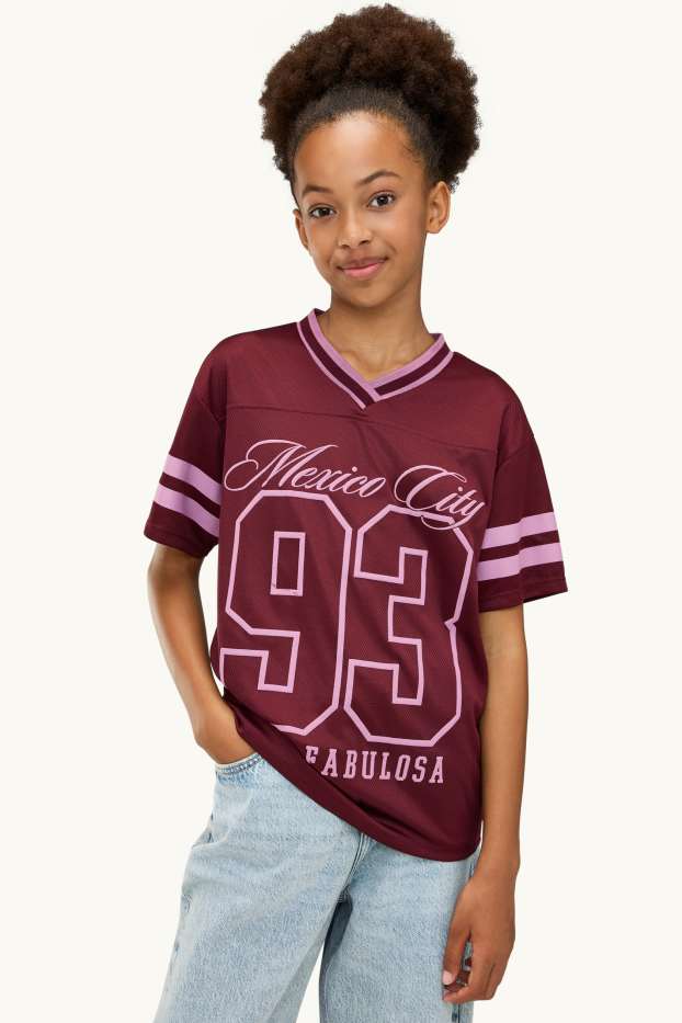 Kinder Mädchen - Kurzarmshirt mit V-Ausschnitt - Oversized - rosa / dunkelrot