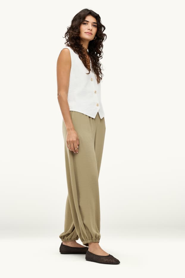 Dames - Harembroek - mid waist - balloon fit - groen