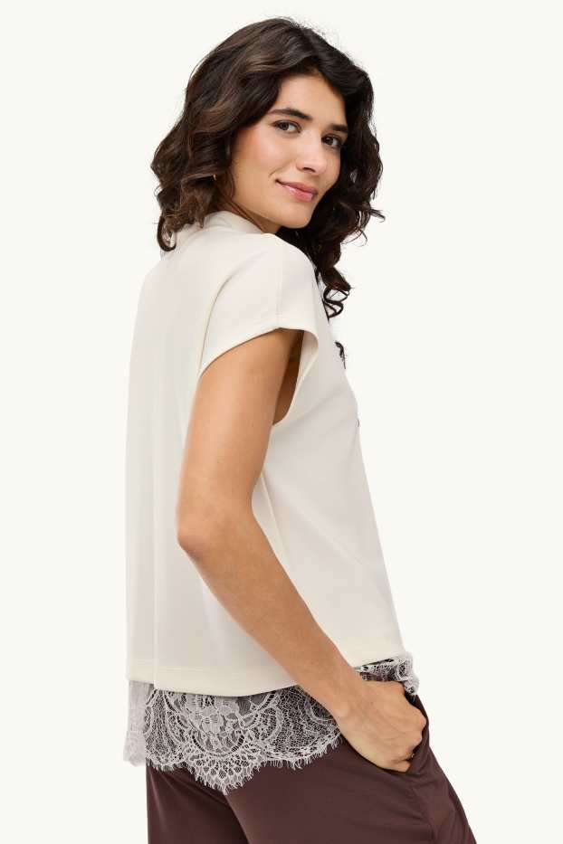 Dames - T-shirt - regular fit - crèmekleurig